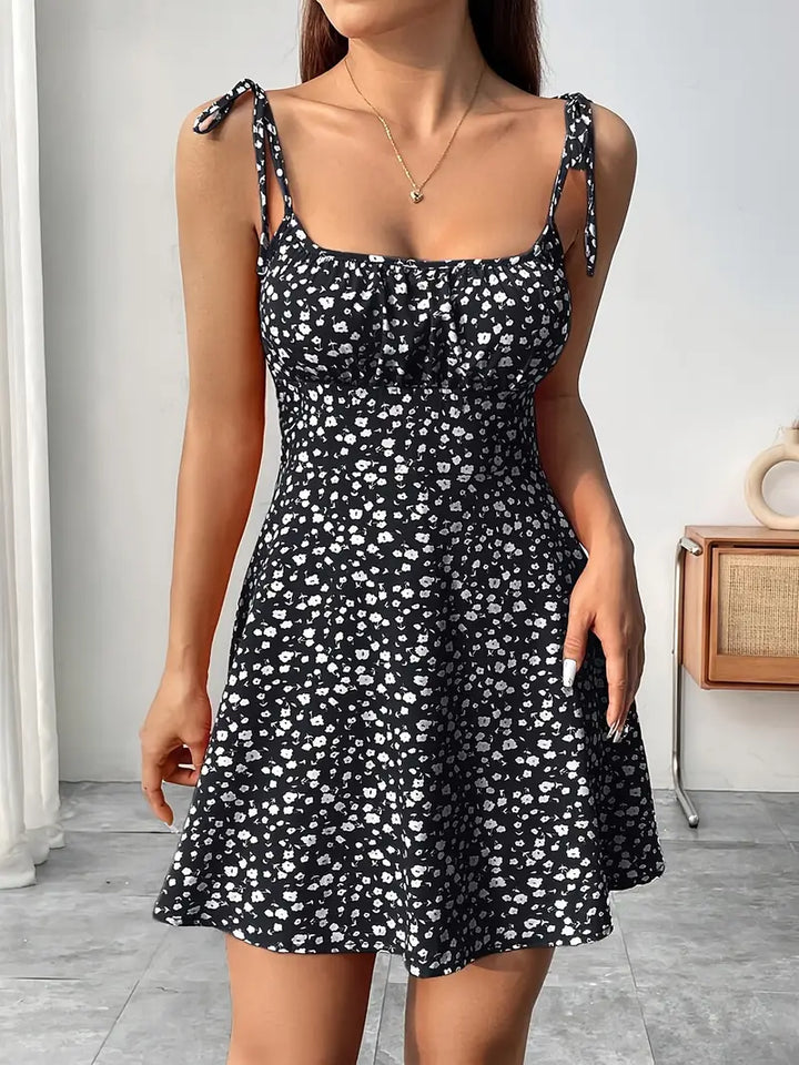 Vestido mini de mujer con estampado floral y tirantes anudados
